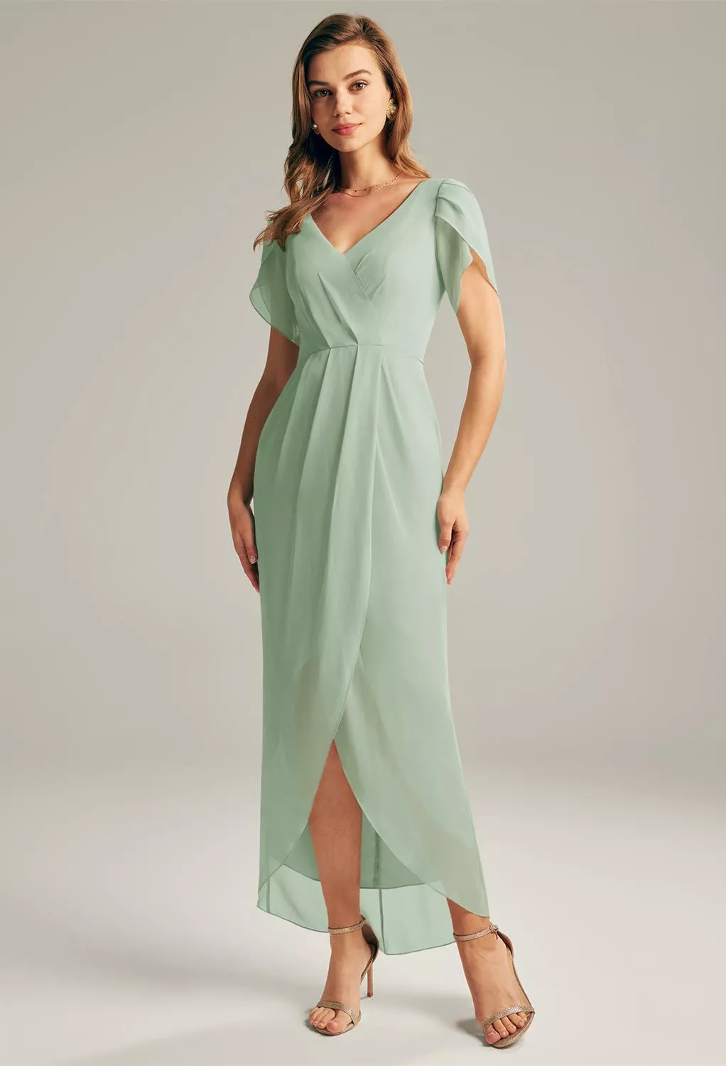 sachin and babi light blue dress The Ultimate Guide to Wedding Dress Styles main image 1